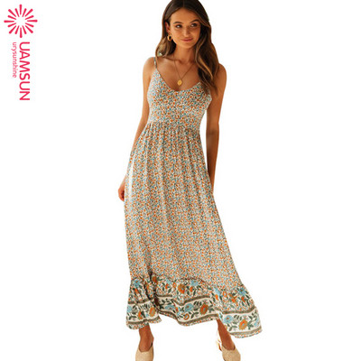 Laisva moteriška ilga suknelė su plonais petnešėlėmis, tinkanti pavasariui ir vasarai