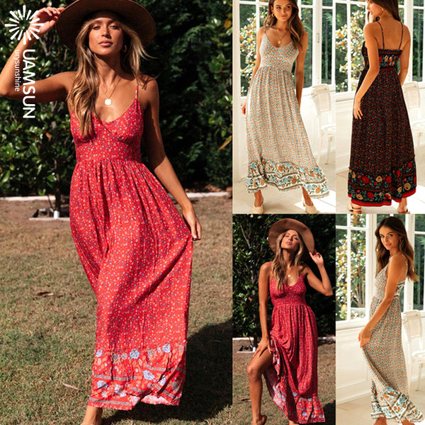 Laisva moteriška ilga suknelė su plonais petnešėlėmis, tinkanti pavasariui ir vasarai