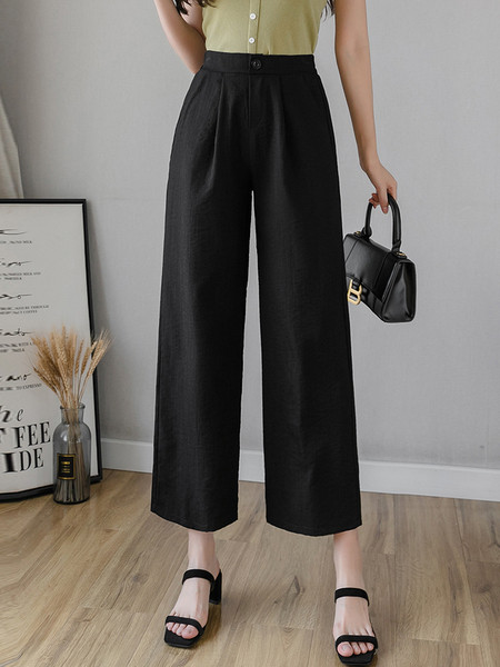 Moteriškos aktualios kelnės platus modelis su kišenėmis