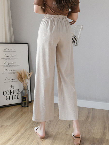 Moteriškos aktualios kelnės platus modelis su kišenėmis