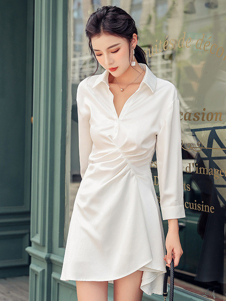 Elegantna ženska haljina s klasičnom kragnom i dugim rukavima