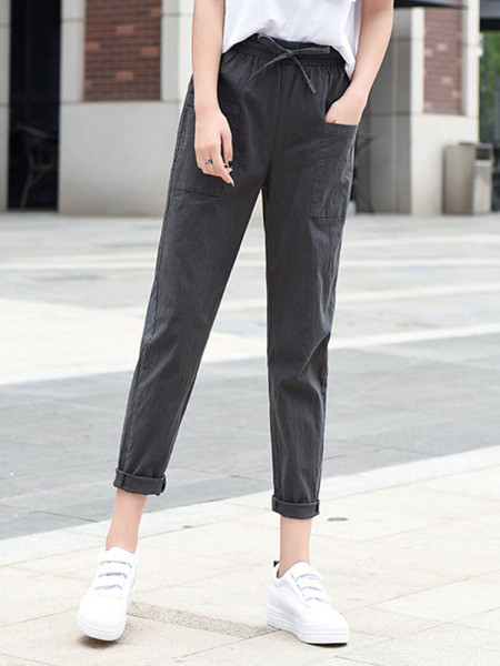 Ležerne ženske hlače ravnog modela s vezicama i džepovima