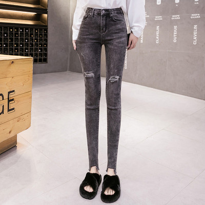 Sieviešu aktuālie džinsi ar saplēstiem motīviem Slim modelis