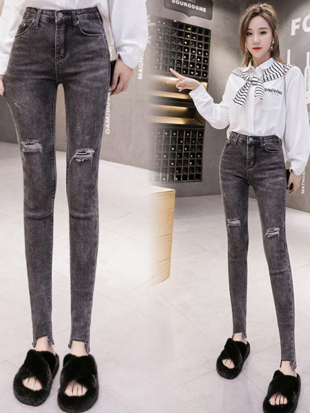 Moteriški dabartiniai džinsai su plėšytais motyvais Slim modelis