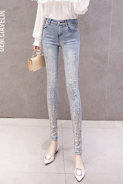 Модерни дамски дънки с декоративни камъни Slim модел