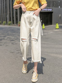 Sieviešu aktuālais džinsu 9/10 garuma plats modelis ar saplēstiem motīviem