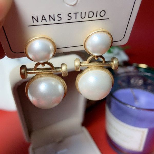 Moteriški kabantys auskarai dekoruoti perlais