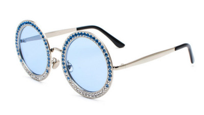 Modernas sieviešu brilles ar apaļu formu un dekorācijas akmeņiem