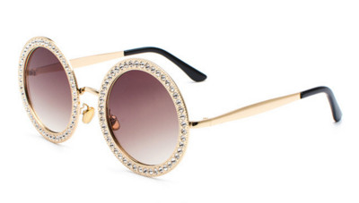 Modernas sieviešu brilles ar apaļu formu un dekorācijas akmeņiem