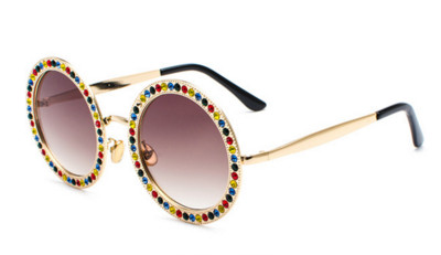 Modernas sieviešu brilles ar apaļu formu un dekorācijas akmeņiem