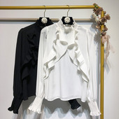 Sieviešu moderns krekls ar lokām un apaļu augstu apkakli