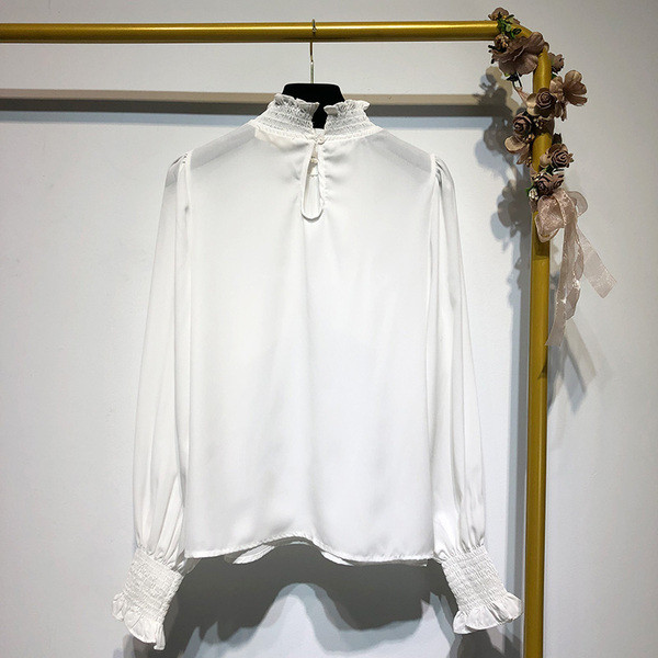 Sieviešu moderns krekls ar lokām un apaļu augstu apkakli