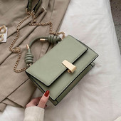 Moderni moteriška rankinė iš eko odos su metaliniu užsegimu, trumpa ir ilga rankenomis