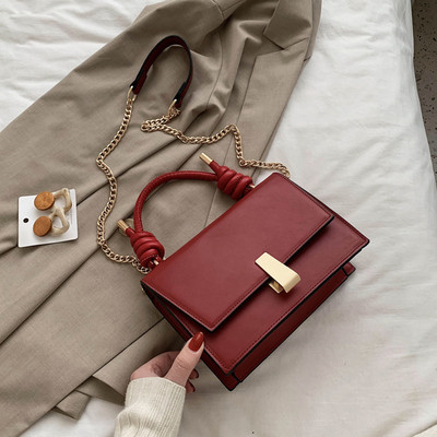 Moderni moteriška rankinė iš eko odos su metaliniu užsegimu, trumpa ir ilga rankenomis