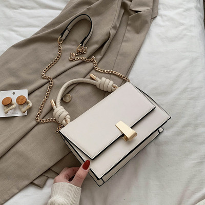 Moderni moteriška rankinė iš eko odos su metaliniu užsegimu, trumpa ir ilga rankenomis