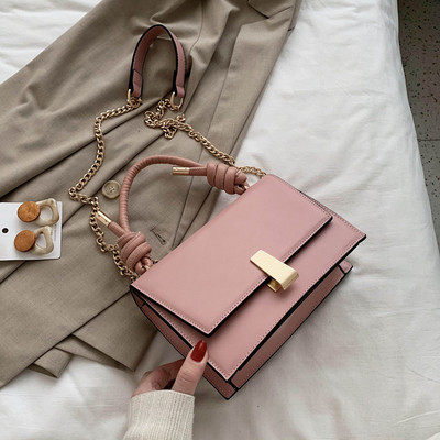 Moderni moteriška rankinė iš eko odos su metaliniu užsegimu, trumpa ir ilga rankenomis