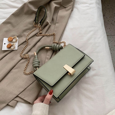 Moderni moteriška rankinė iš eko odos su metaliniu užsegimu, trumpa ir ilga rankenomis