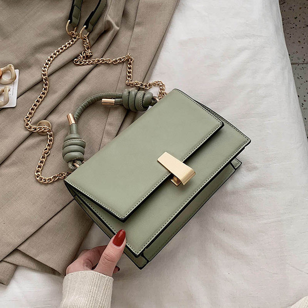 Moderni moteriška rankinė iš eko odos su metaliniu užsegimu, trumpa ir ilga rankenomis