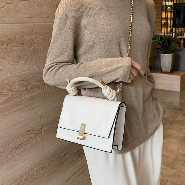 Moderni moteriška rankinė iš eko odos su metaliniu užsegimu, trumpa ir ilga rankenomis