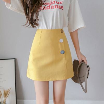 Къса дамска пола с висока талия и цветни копчета 