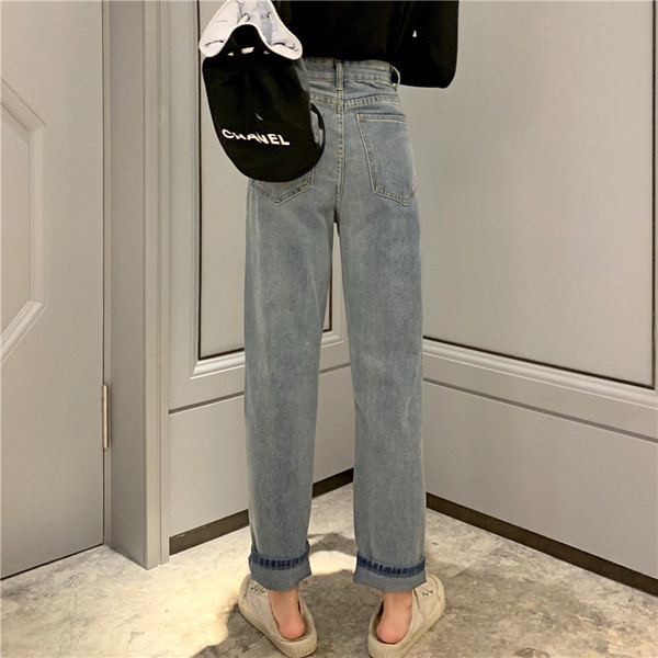 Moderns sieviešu džinsu plats modelis ar augstu vidukli un ielāpiem