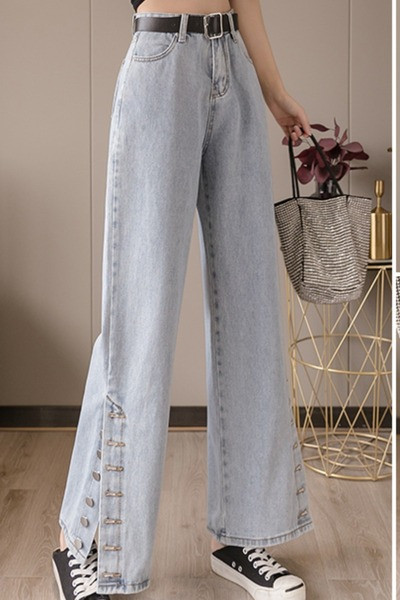 Sieviešu džinsi ar augstu vidukli un pogām - plats modelis