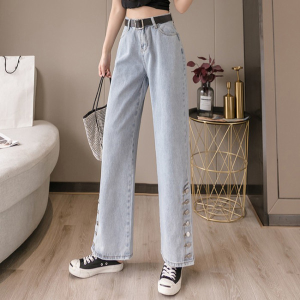 Sieviešu džinsi ar augstu vidukli un pogām - plats modelis