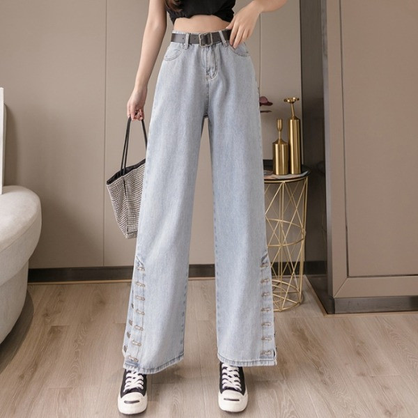 Sieviešu džinsi ar augstu vidukli un pogām - plats modelis