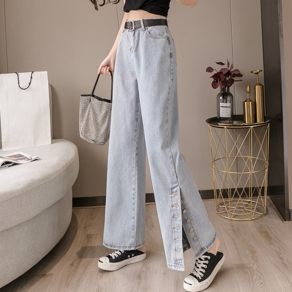 Sieviešu džinsi ar augstu vidukli un pogām - plats modelis