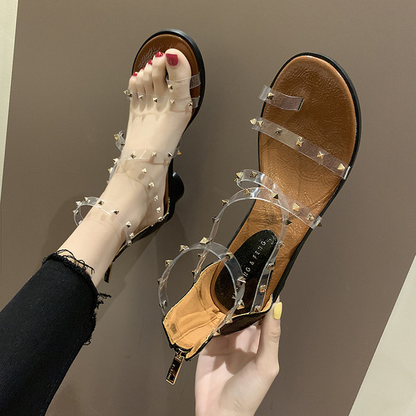 Modernas sieviešu sandales ar silikona lencēm un metāla cilpām