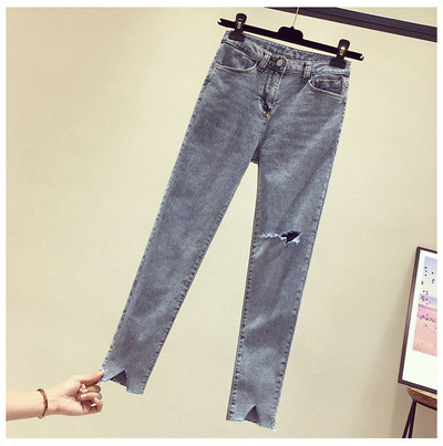 Sieviešu garie džinsi ar augstu vidukli un plēstiem motīviem