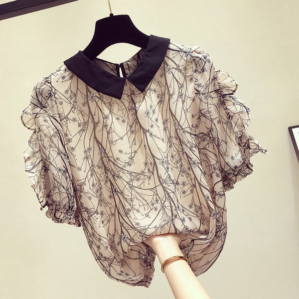 Moderns sieviešu krekls ar 3/4 piedurknēm un ovālu kakla izgriezumu