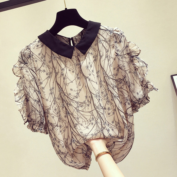 Moderns sieviešu krekls ar 3/4 piedurknēm un ovālu kakla izgriezumu