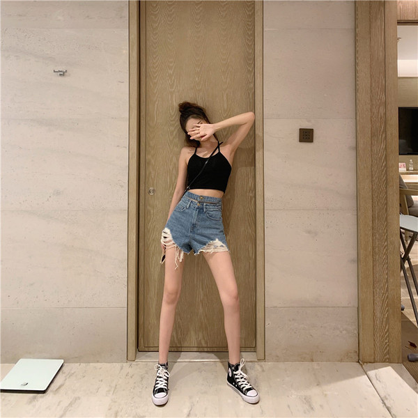 Džinsiniai šortai aukštu liemeniu su plėšytais motyvais