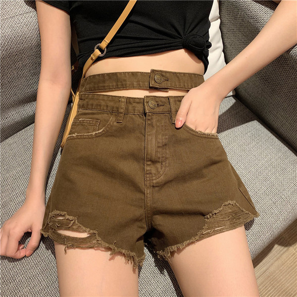 Džinsiniai šortai aukštu liemeniu su plėšytais motyvais