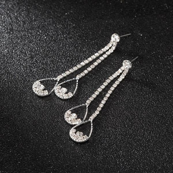 Modernūs moteriški kabantys auskarai su sidabriniais akmenukais