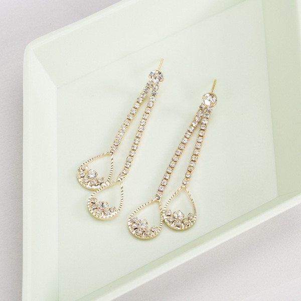 Modernūs moteriški kabantys auskarai su sidabriniais akmenukais