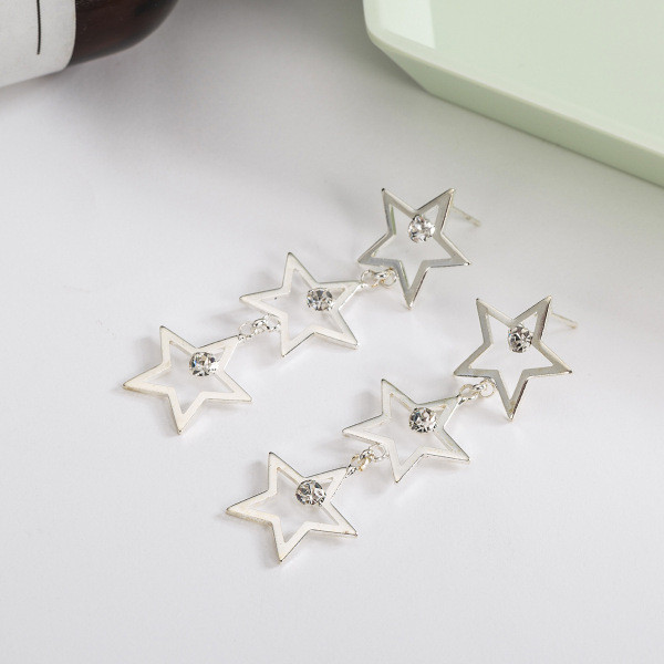 Modernūs moteriški kabantys žvaigždės formos auskarai