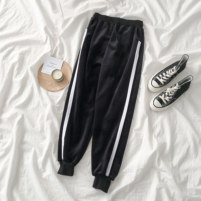 Sieviešu ziemas sporta samta bikses ar oderi un baltu apmalīti