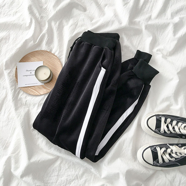 Sieviešu ziemas sporta samta bikses ar oderi un baltu apmalīti