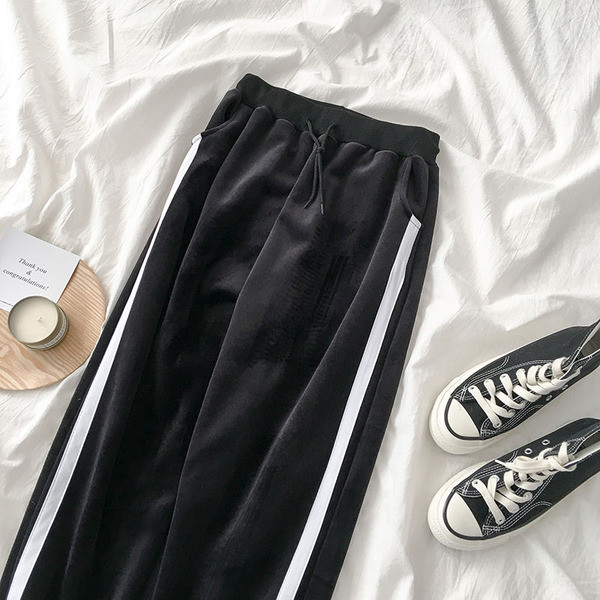 Sieviešu ziemas sporta samta bikses ar oderi un baltu apmalīti