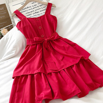 Pavasariška moteriška suknelė su plačiomis petnešėlėmis ir kaspinu