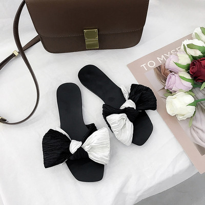 Дамски ежедневни чехли с равна подметка и  панделка