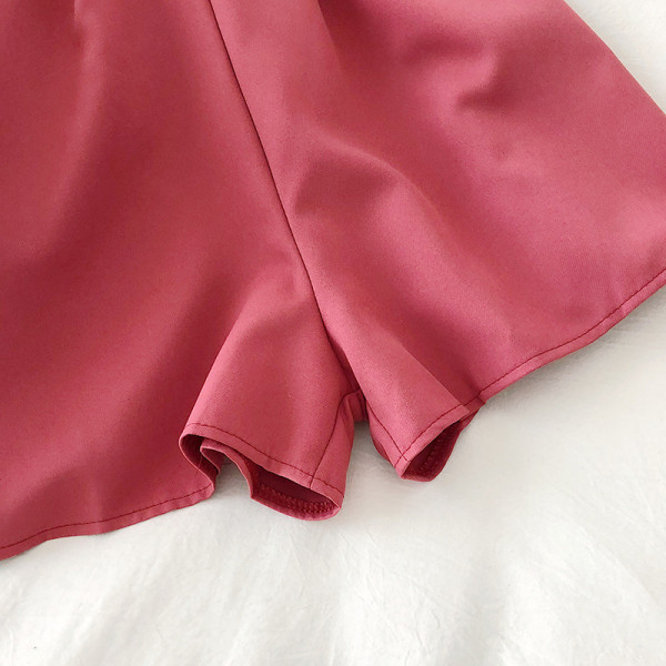 Модерен дамски гащеризон с паднали ръкави и тънки презрамки 