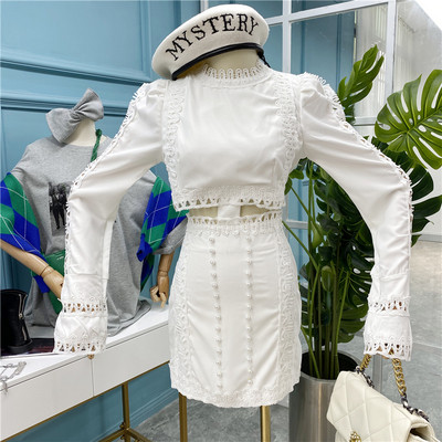 Нов модел стилна дамска рокля с изрязана част, дантела и перли