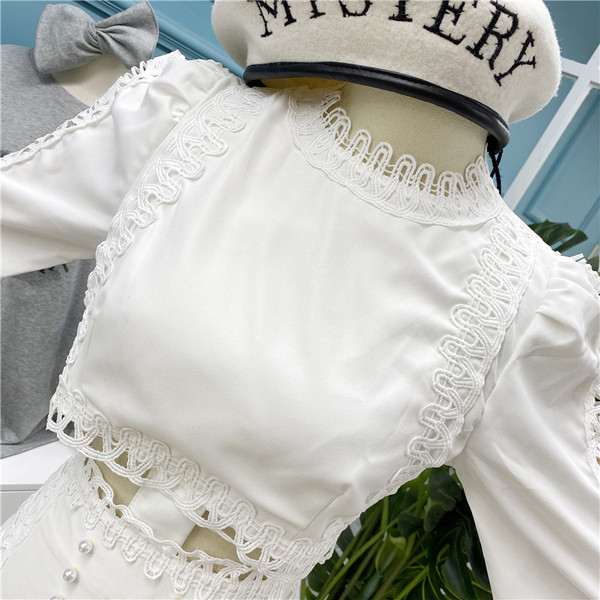 Нов модел стилна дамска рокля с изрязана част, дантела и перли