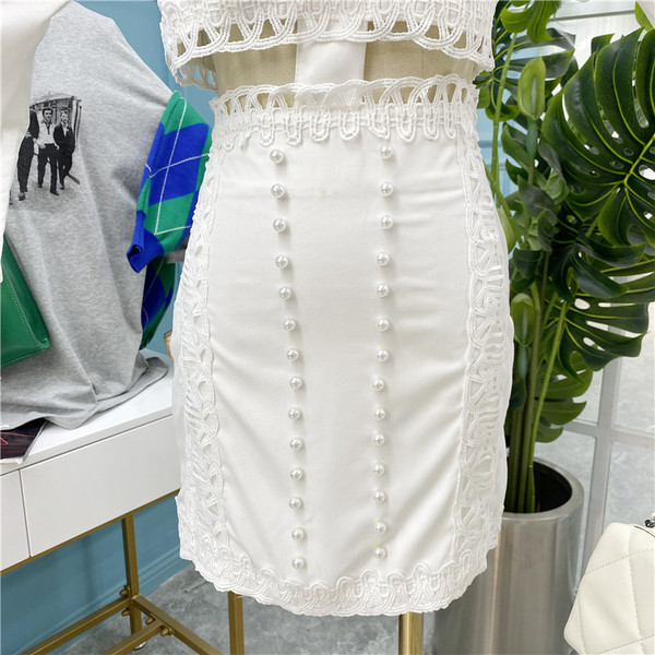 Нов модел стилна дамска рокля с изрязана част, дантела и перли