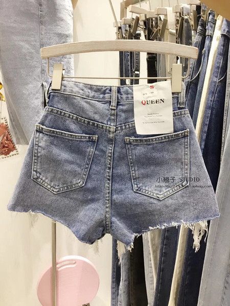 ХИТ Дамски къси дънкови панталони с разкъсани мотиви