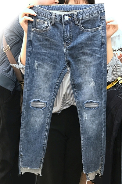 Модерни дамски дънки Slim модел с разкъсани мотиви и висока талия 