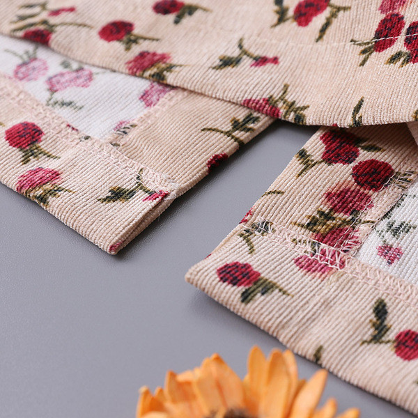 Tavaszi női szoknya kordbársonyból, magas derékkal és virágmotívumokkal